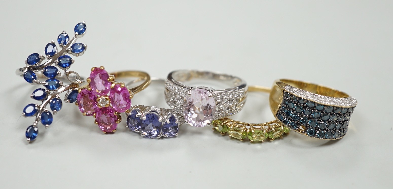 Six assorted modern 9ct gold and gem set dress rings, including three white gold, gross weight 20 grams.